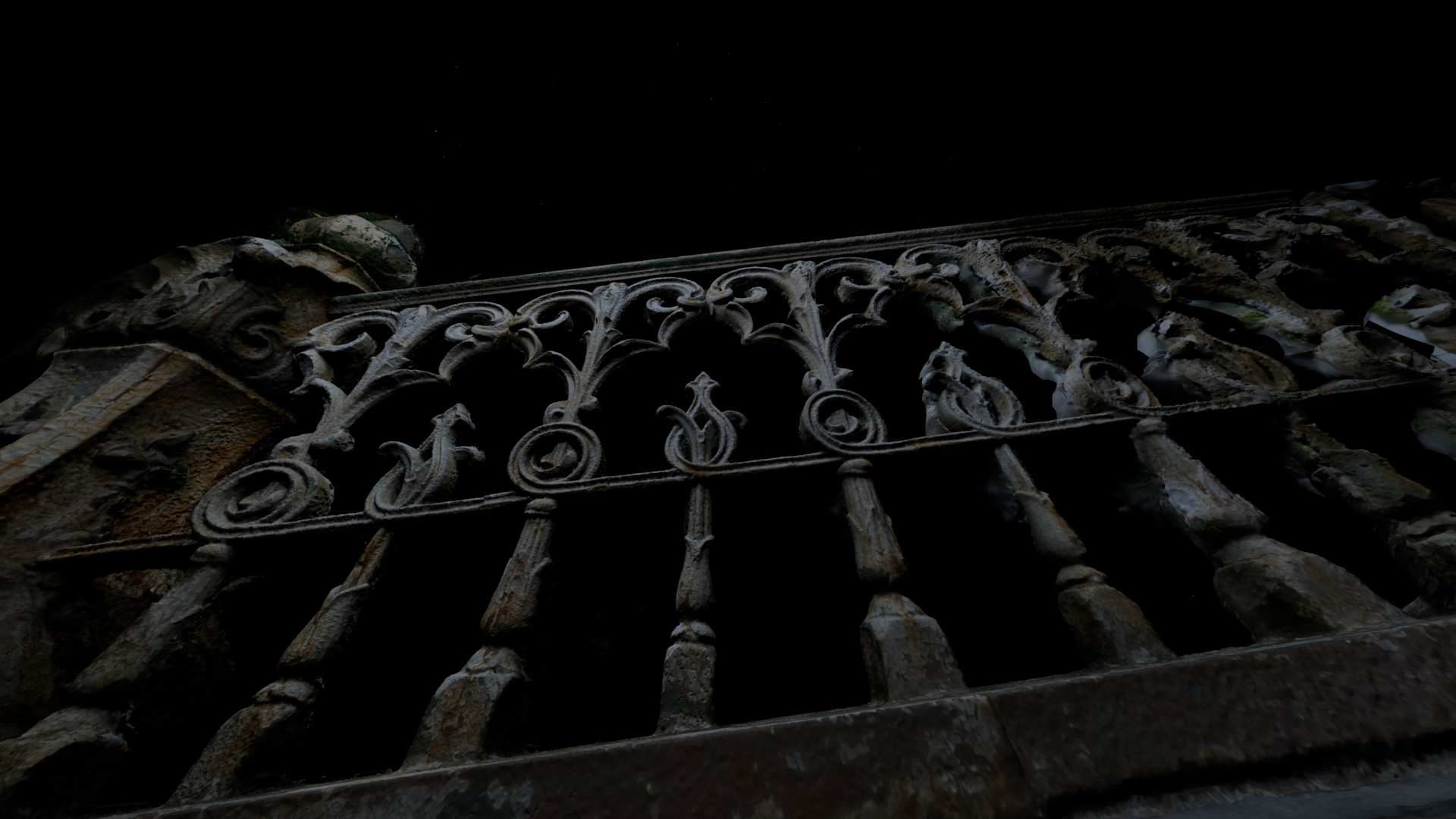 a gate with curly whimsical lines