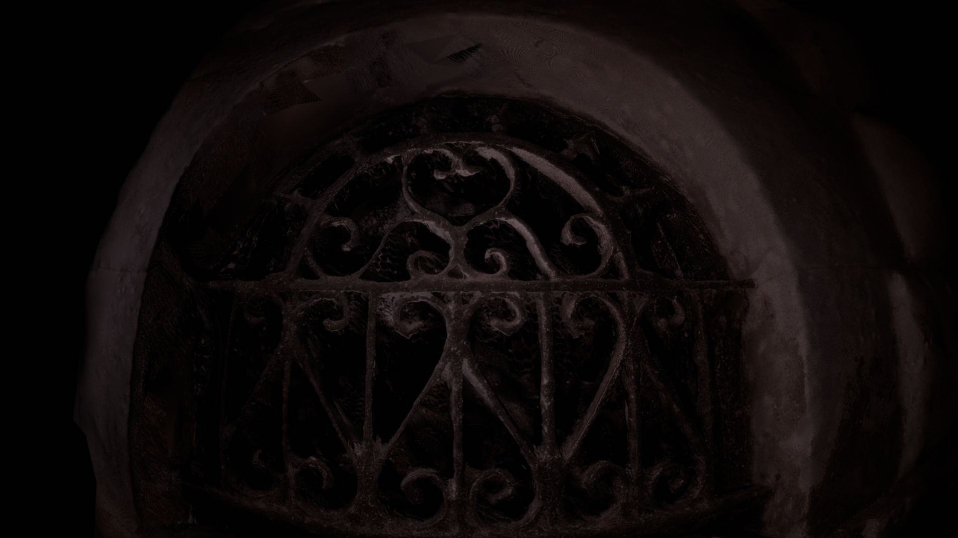 an indexed gate with curly whimsical lines